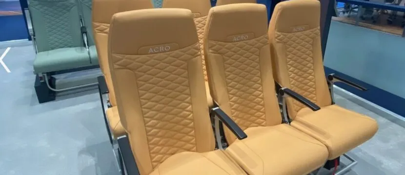 Acro Series 6 seat triples, two in yellow, and behind it one row of green